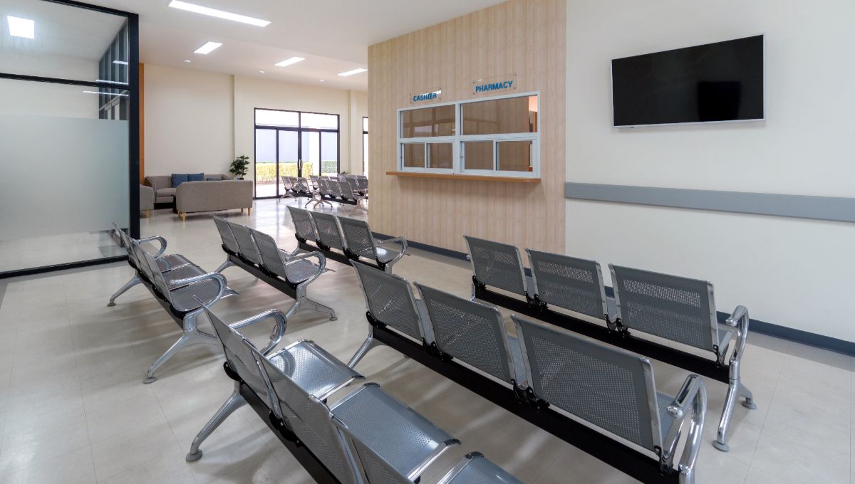 Clean healthcare and care facility interior with reception, waiting area and practical commercial finishes.